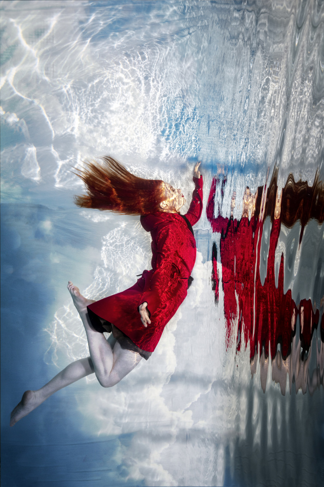 Floating Red Dress by Petr Kleiner — canvas wall art