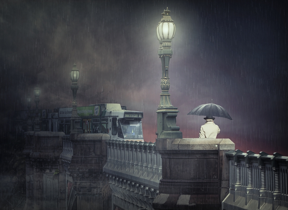 Man on Rainy Bridge by Adrian Donoghue — canvas wall art