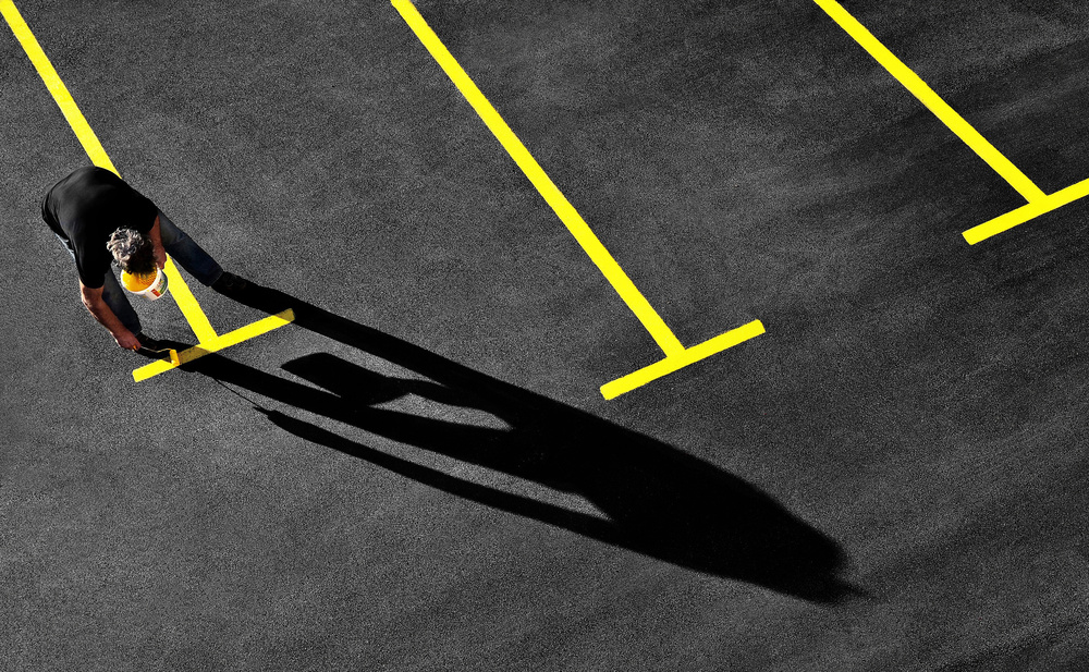 Man Painting Yellow Lines by Samanta Krivec — canvas wall art