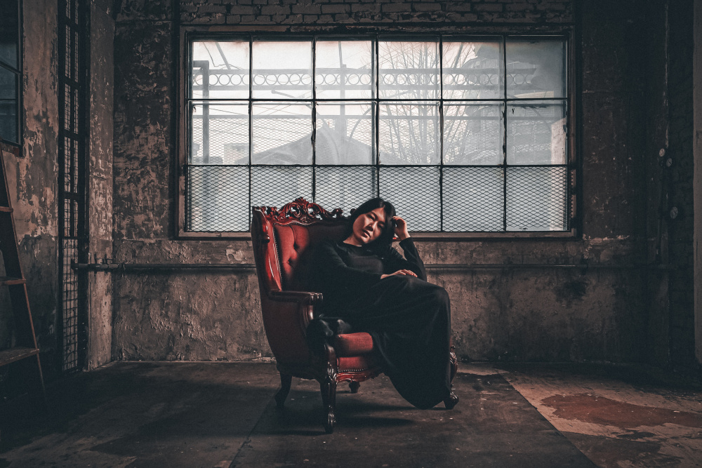 Pensive Woman in Red Chair by Kim gyou-pyo — canvas wall art