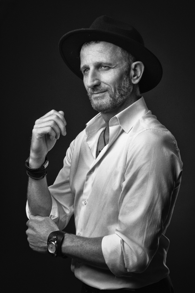 Confident Man in Fedora by Dariusz Budyta — canvas wall art