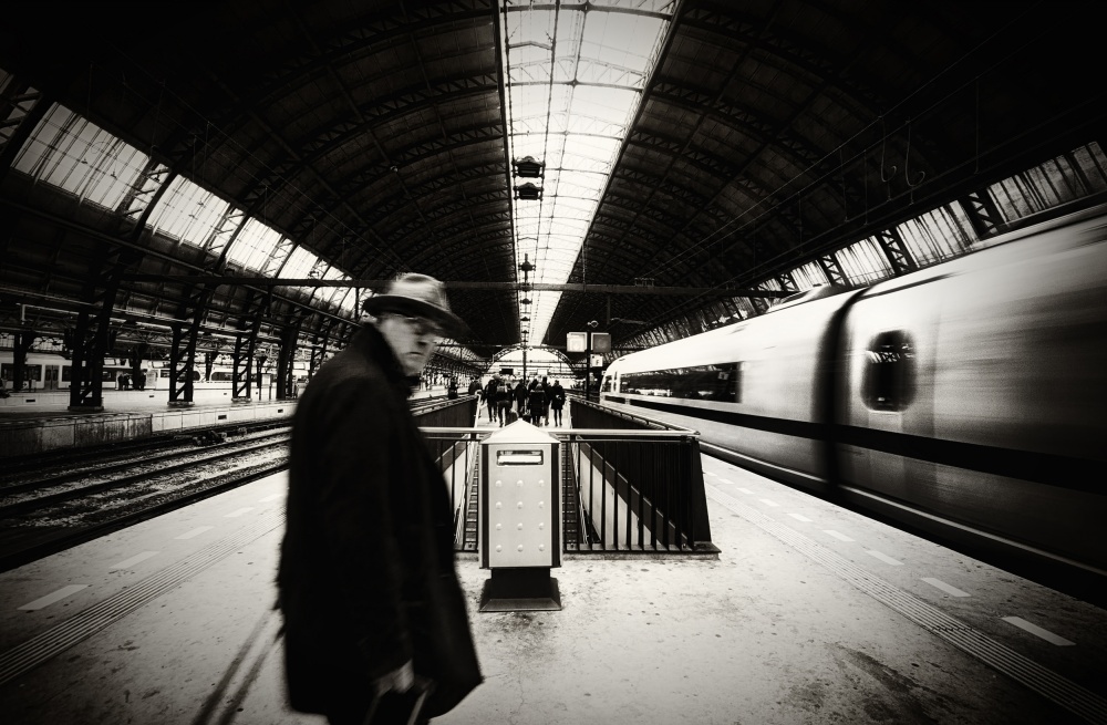 Man and Speeding Train by Mark Yugawa — canvas wall art