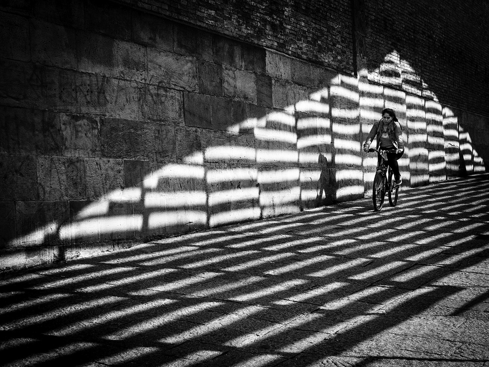 Striped Shadow Cyclist by Adolfo Urrutia — canvas wall art