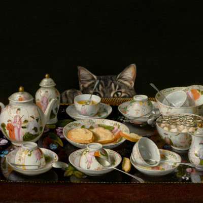 A Tea Set With A Cat