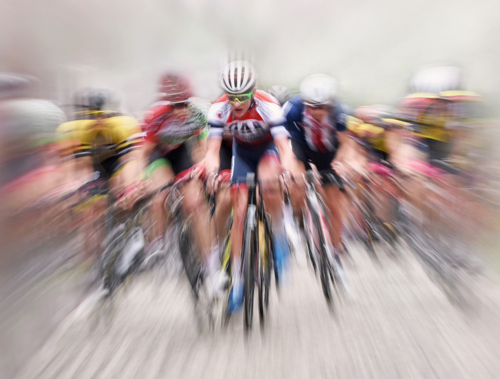 Speeding Cyclists by Lou Urlings — canvas wall art