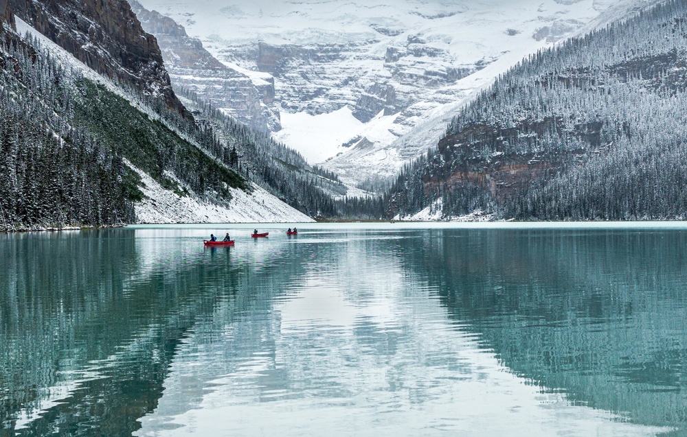 Canoes on Winter Lake by Ann Cornelis — canvas wall art