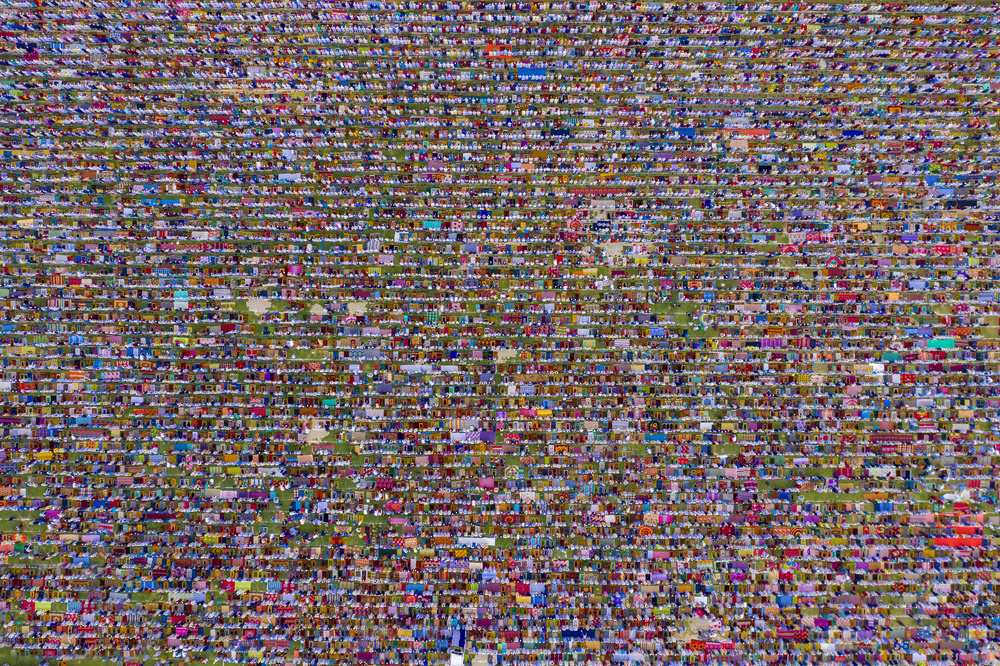Vibrant Sea of Worshippers by Azim Khan Ronnie — canvas wall art