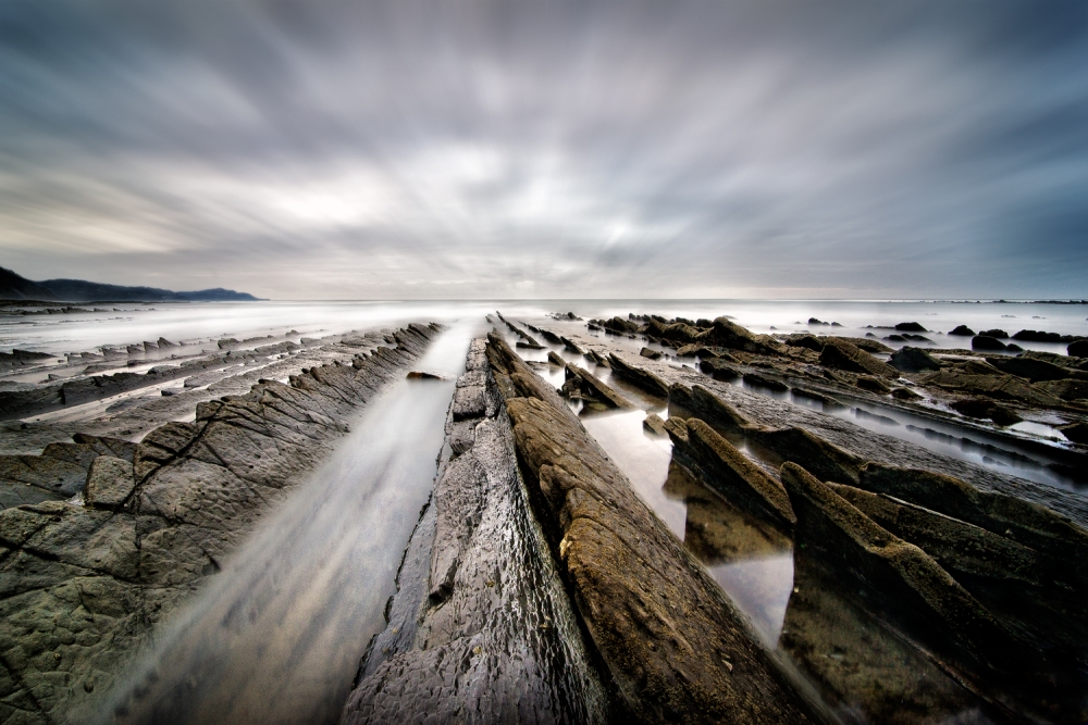 Serene Coastal Flow by Fran Osuna — canvas wall art