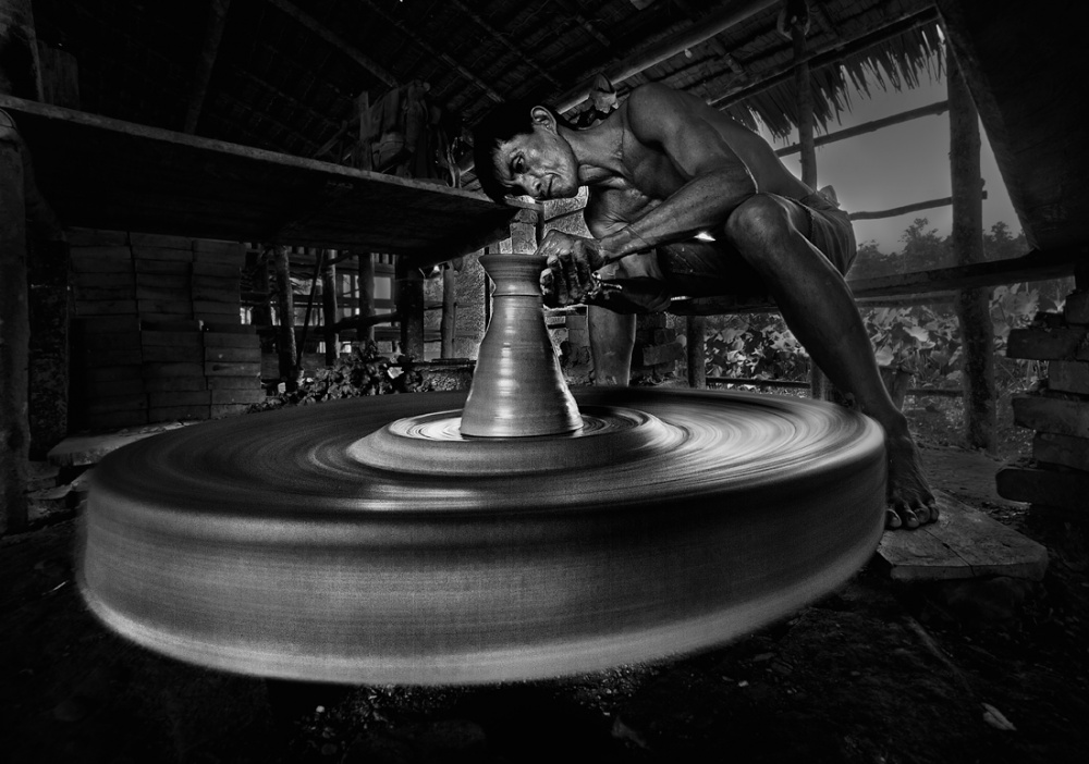 Artisan on Pottery Wheel by dodyherawan — canvas wall art