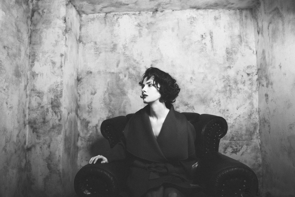 Pensive Woman With Cigar by Dmitrii Rabeev — canvas wall art