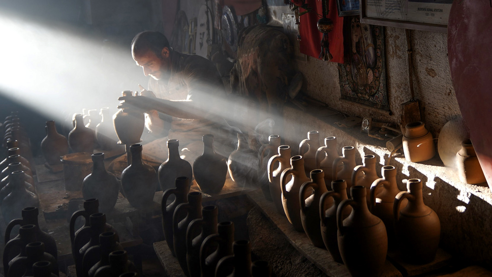 Potter's Sunlit Craft by Ayse  Yorgancilar — canvas wall art