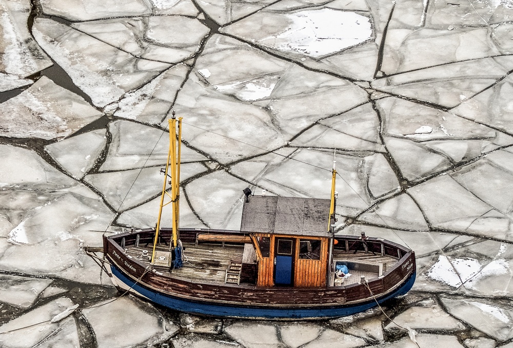 Fishing Boat on Ice by Holger Schmidtke — canvas wall art