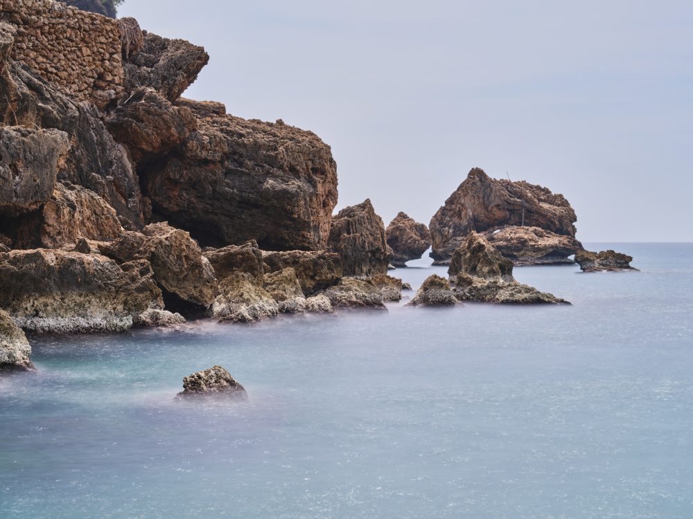 Serene Rocky Coastline by engin akyurt — canvas wall art