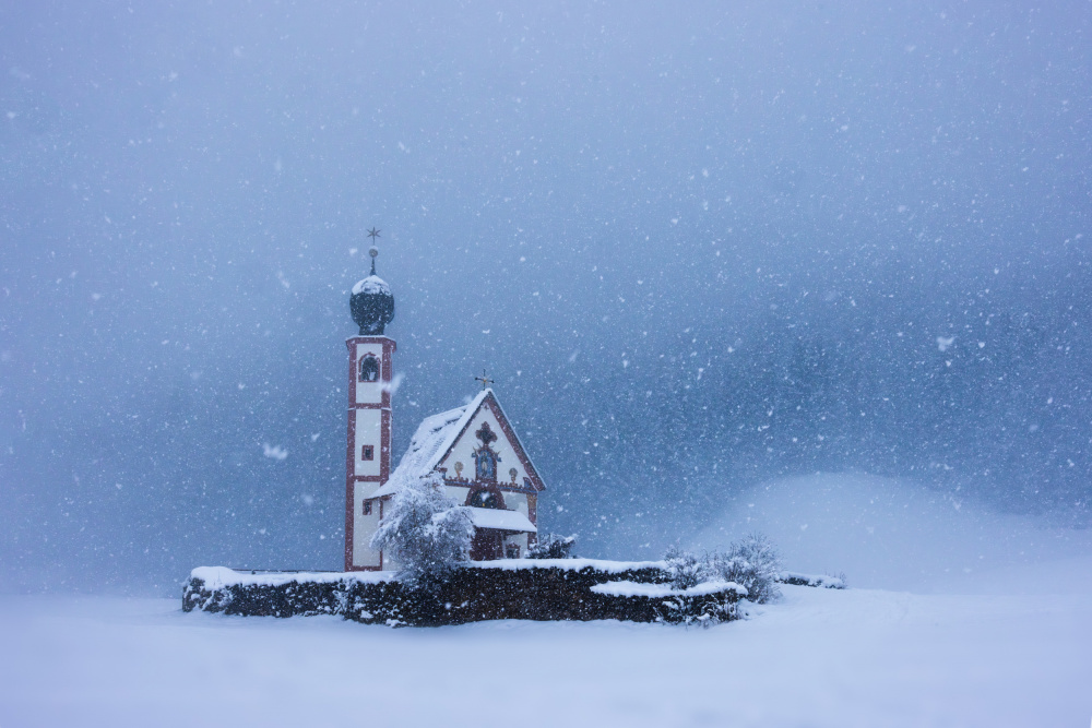 Snowy Alpine Church by James Bian — canvas wall art