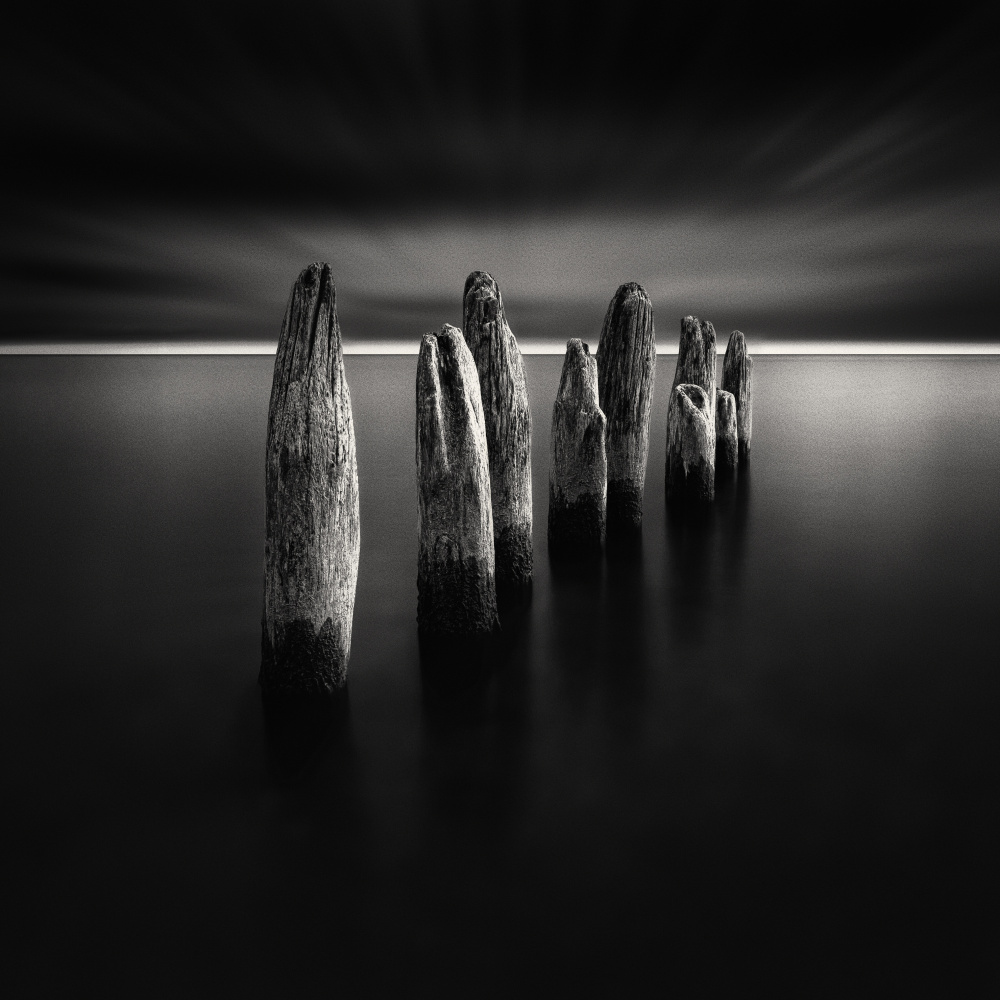 Moody Ocean Pilings by Steven Zhou — canvas wall art