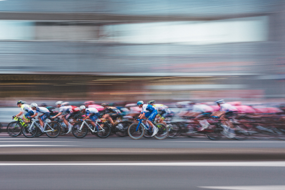 Peloton In Motion by Haruaki Taguchi — canvas wall art