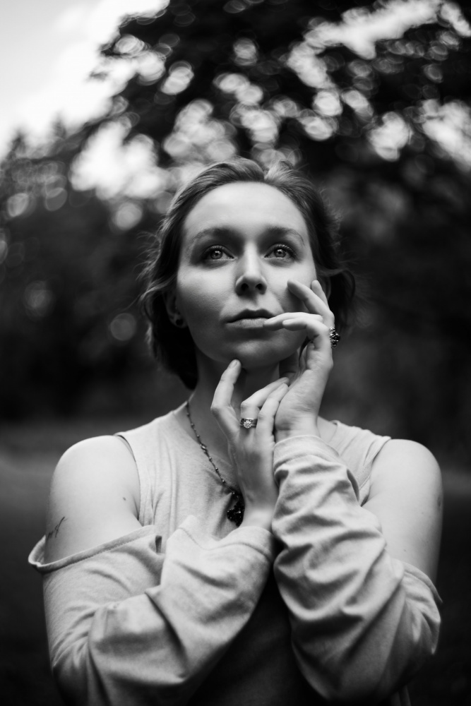 Pensive Woman Looking Up by Dmitrii Rabeev — canvas wall art