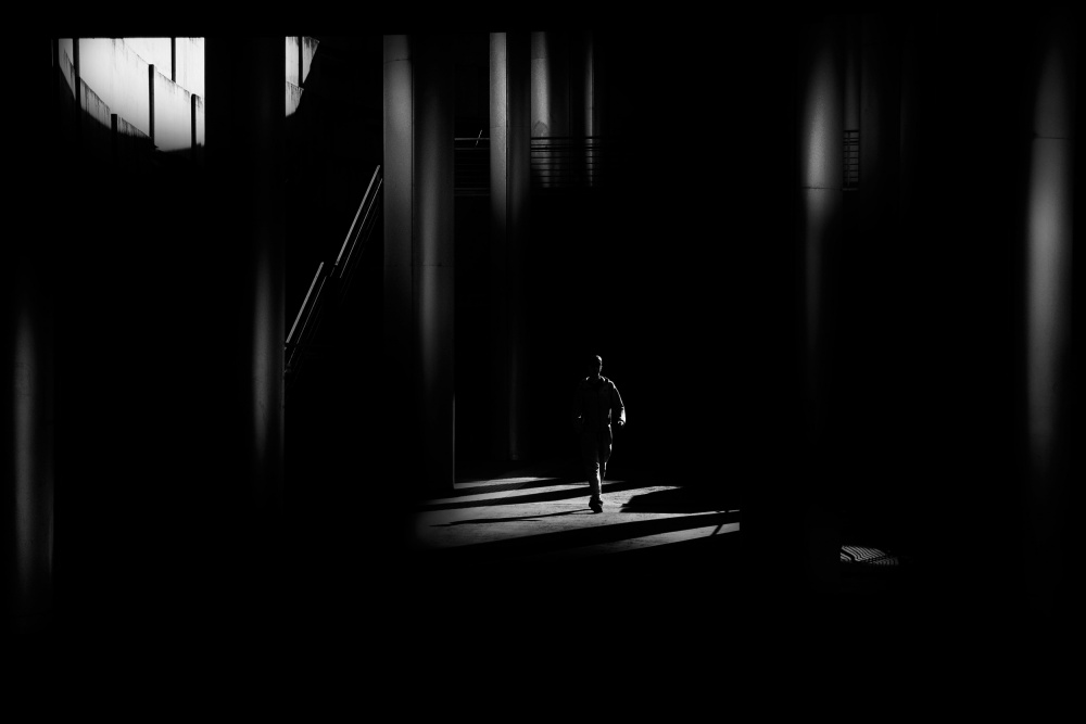 Man Walking Through Shadows by Antonio Grambone — canvas wall art