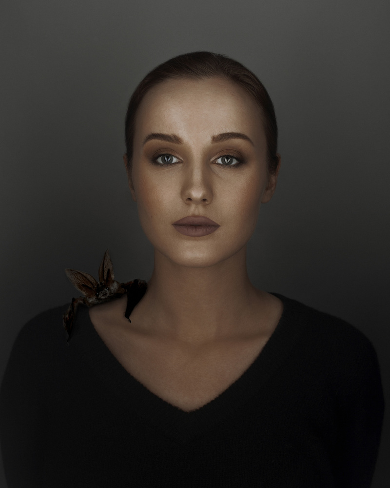 Mysterious Woman and Bat by marinastudio — canvas wall art