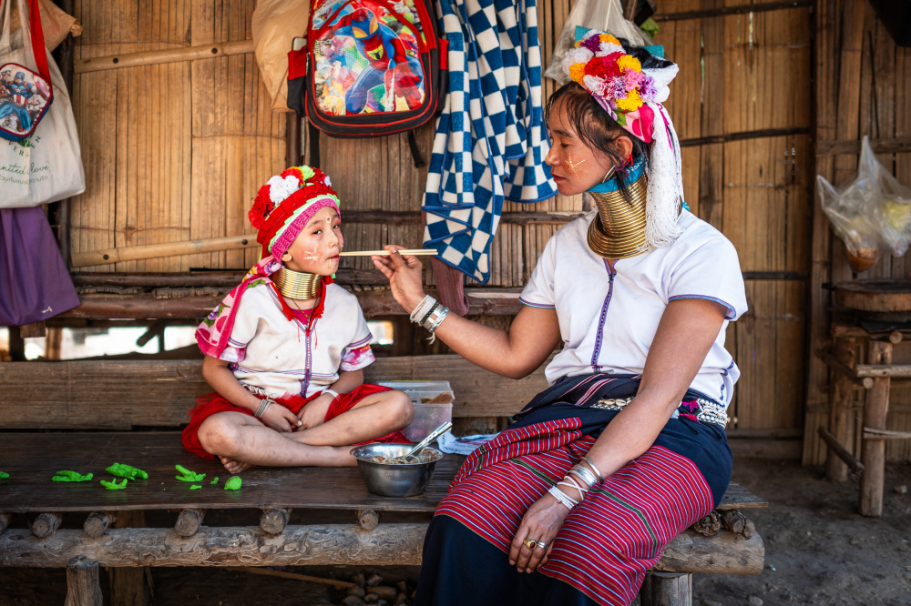 Kayan Woman Feeds Child by Alan Kwang — canvas wall art