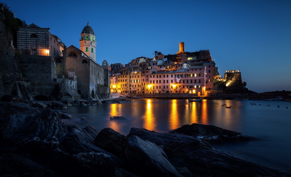 Illuminated Coastal Village by Sus Bogaerts — canvas wall art