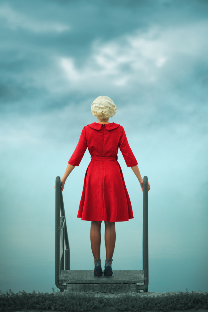 Woman in Red by Water by Ildiko Neer — canvas wall art