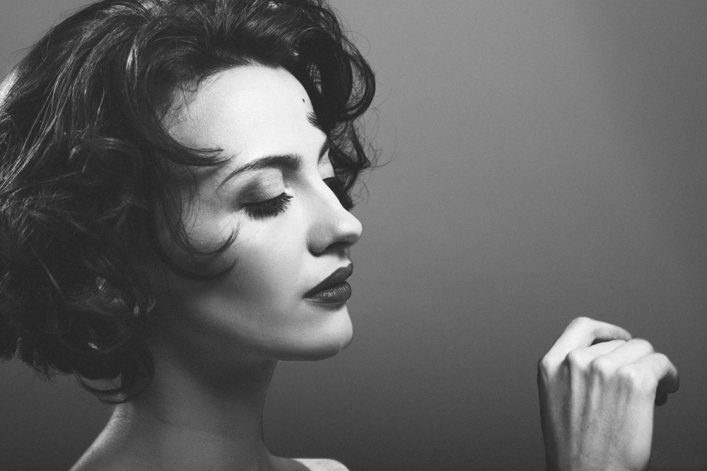 Pensive Woman's Profile by Dmitrii Rabeev — canvas wall art