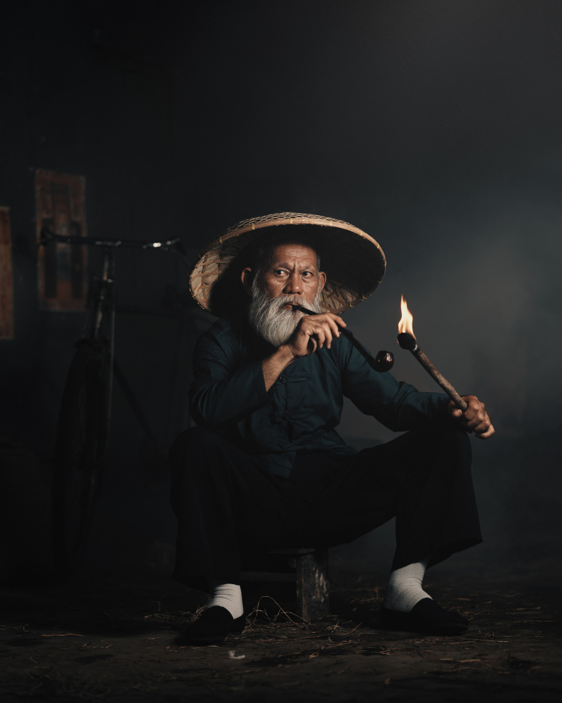 Wise Elder Smoking Pipe by Asep Awaludin — canvas wall art