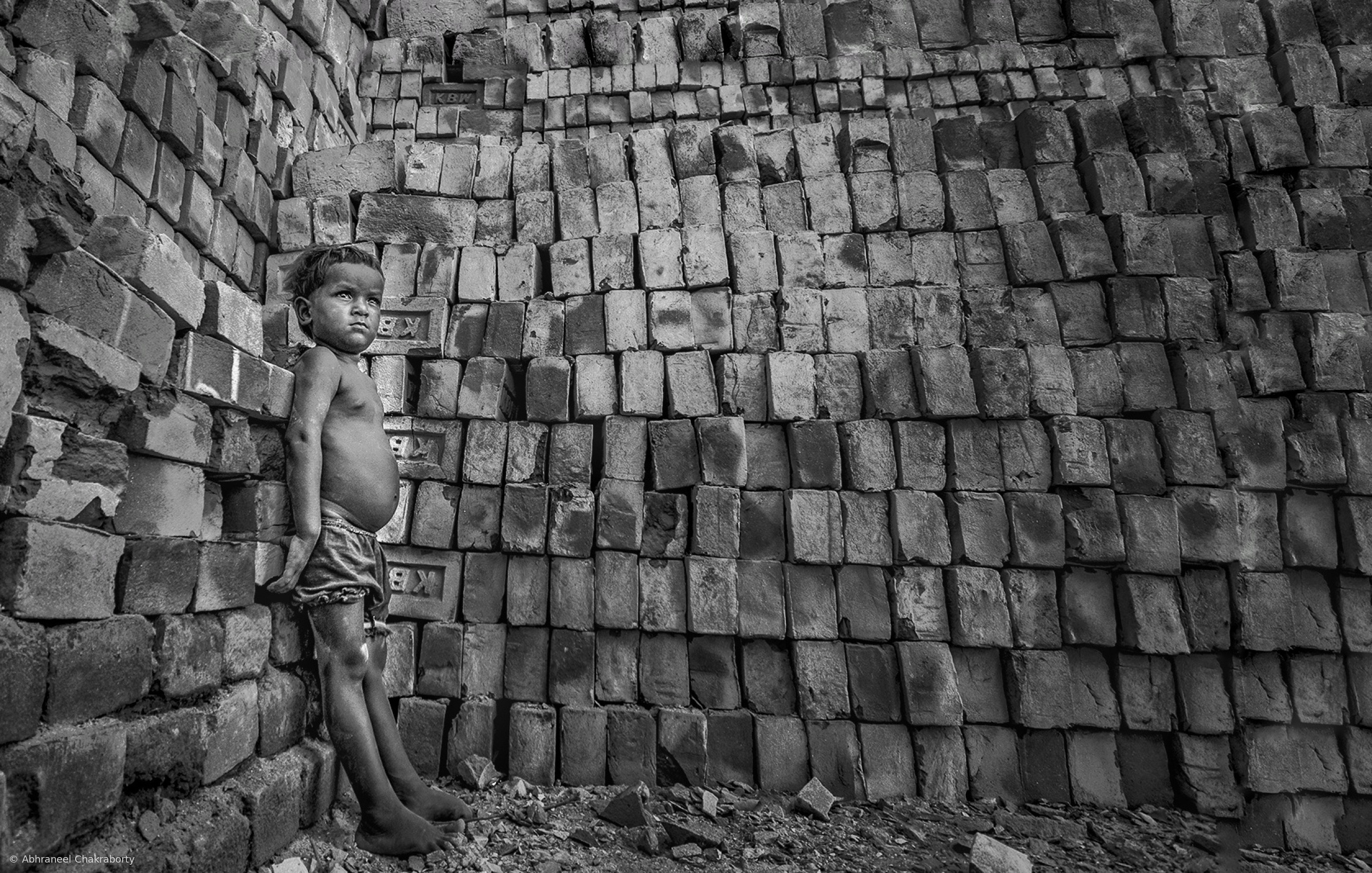 Child in brick field