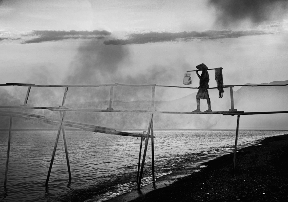 Man on Misty Bridge by Timur Türkmen — canvas wall art