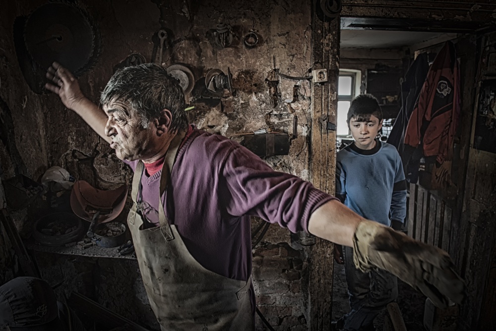 Craftsman and Young Observer by Tunc Tuncel — canvas wall art
