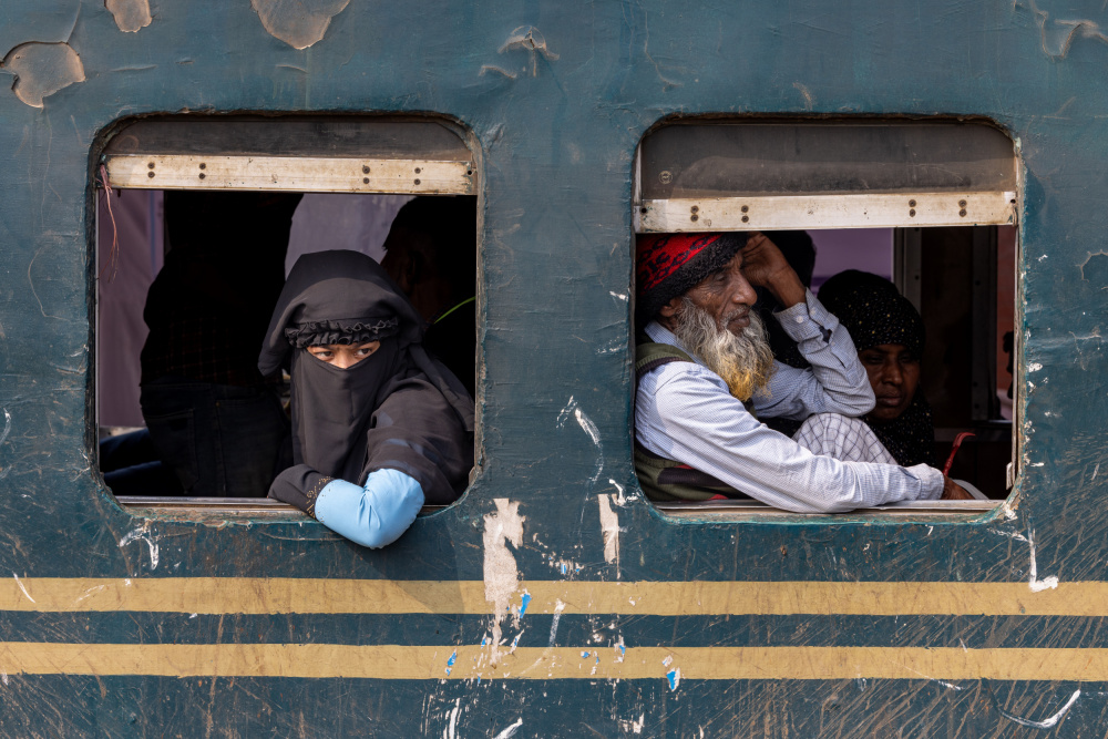 Train Window Travelers by Azim Khan Ronnie — canvas wall art