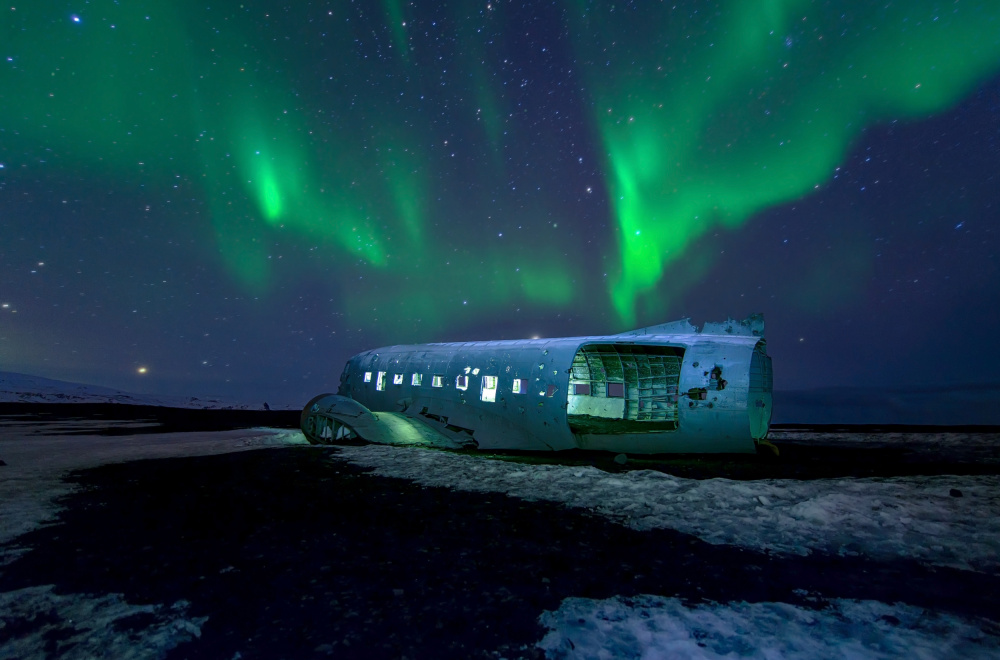 Icelandic Aurora Plane Wreck by Andrea Auf dem Brinke — canvas wall art