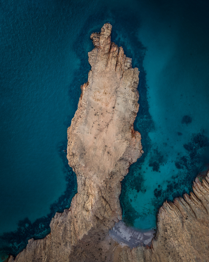 Turquoise Sea Cliffs by Khalid Jamal — canvas wall art