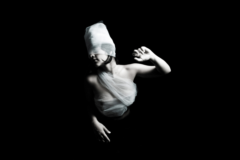Mysterious Shrouded Woman by Melissa Osorio — canvas wall art