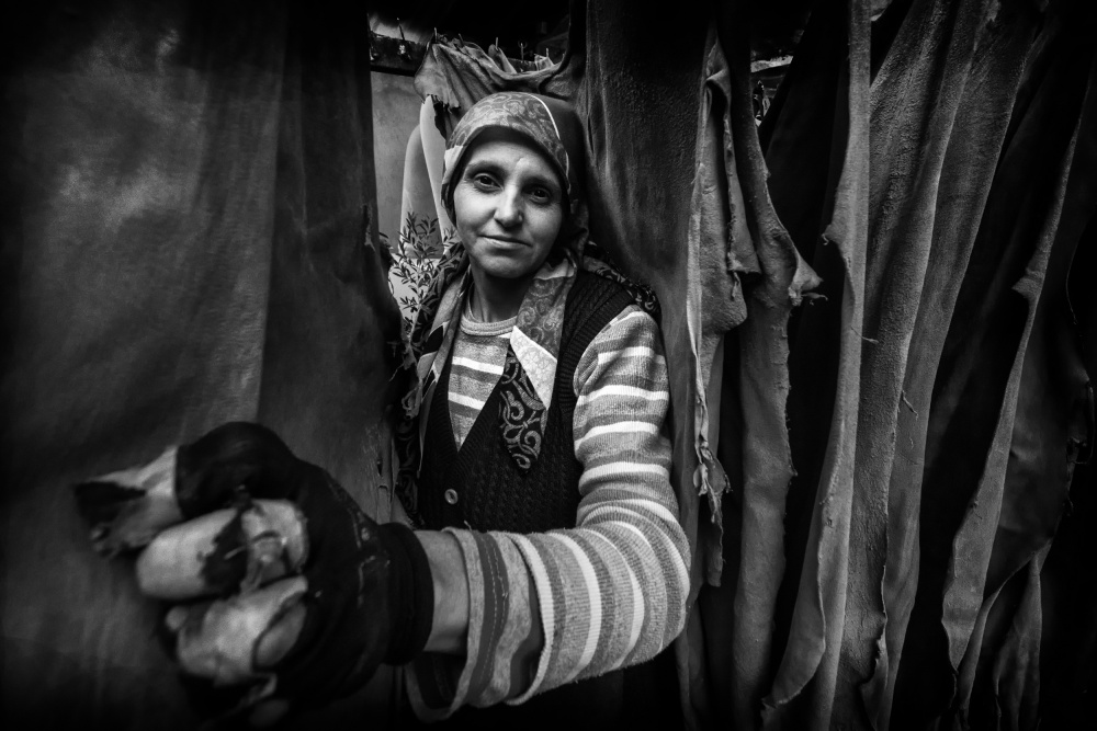 Market Woman Portrait by S. Aktrk — canvas wall art