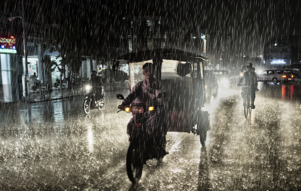Monsoon Street Night by Andrei Nicolas - The Traveler — canvas wall art