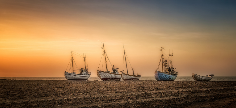 Coastal Sunset Boats by Ole Moberg Steffensen — canvas wall art