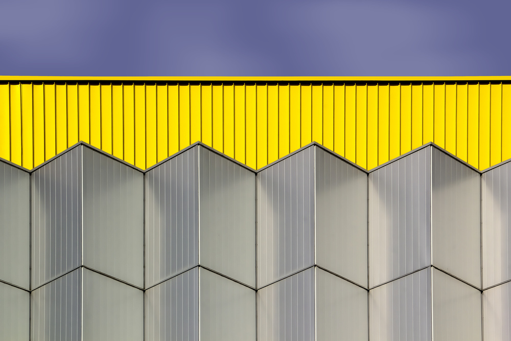 Geometric Yellow Building by Rolf Mauer — canvas wall art