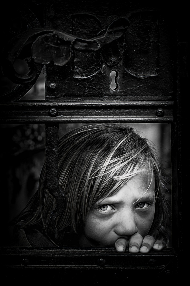 Child Behind the Gate by Danna Sladjana — canvas wall art