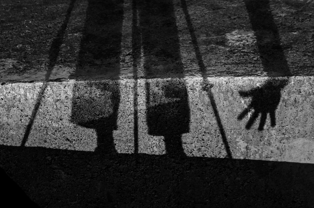 Reaching Shadow Hand by E. de Juan — canvas wall art