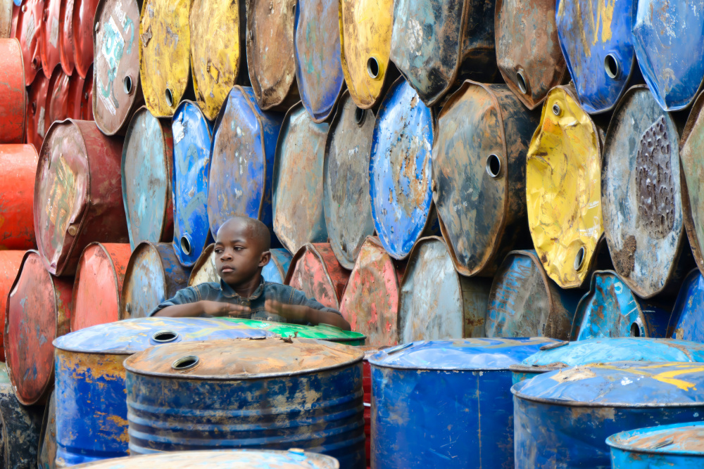 Boy Among Colorful Drums by Florent Dirk Thies — canvas wall art