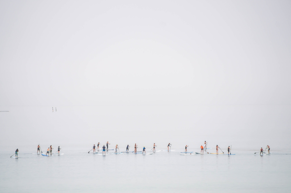 Misty Water Paddleboarders by Joshua Raif — canvas wall art
