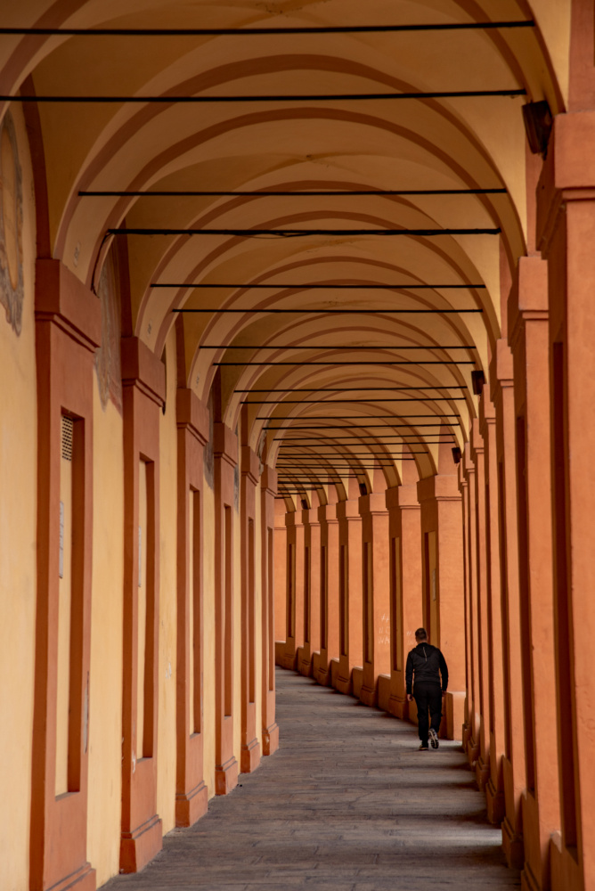 Solitary Walk Under Arches by Barbara Nussel — canvas wall art