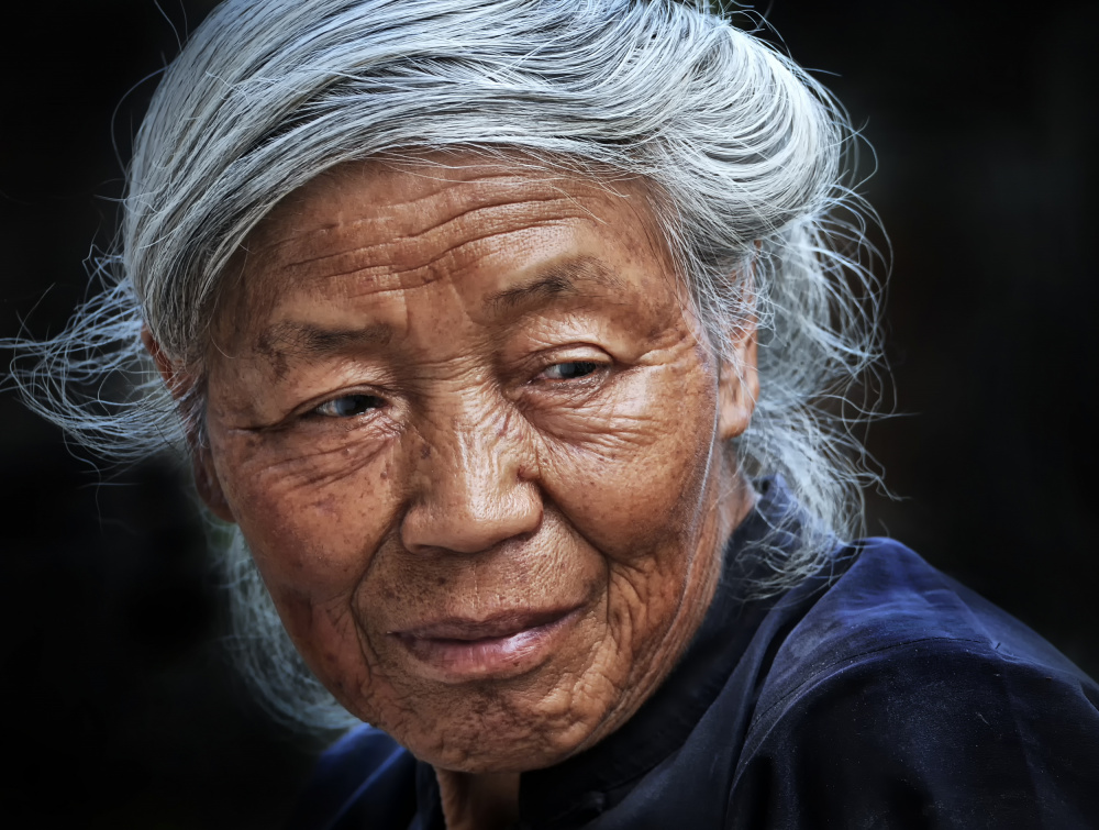 Wise Asian Woman Smile by Lou Urlings — canvas wall art