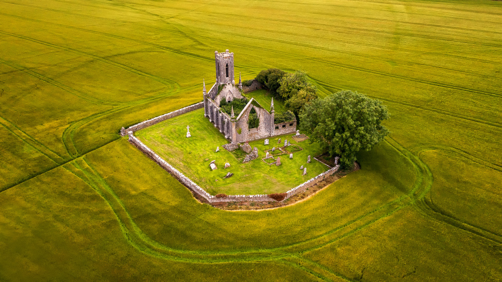 Ancient Stone Church Field by Peter Krocka — canvas wall art