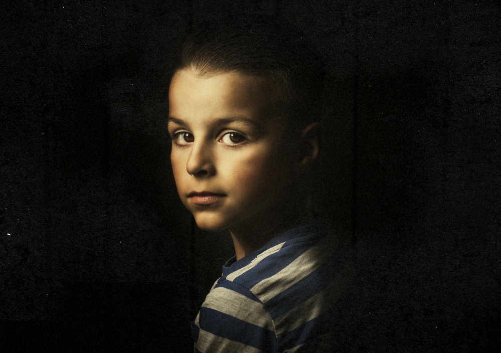 Thoughtful Boy Portrait by Amir Bajrich — canvas wall art