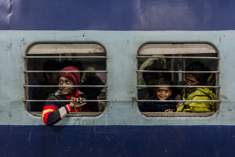 Curious Train Travelers by Yasemin Bakan — canvas wall art