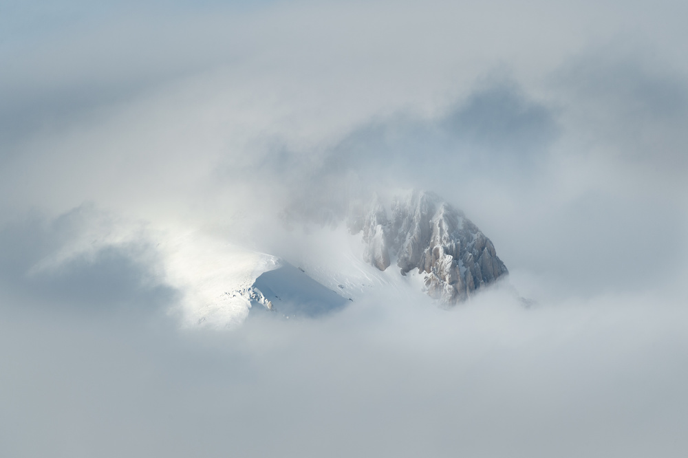 Snowy Peaks In Clouds by Riccardo Lucidi — canvas wall art
