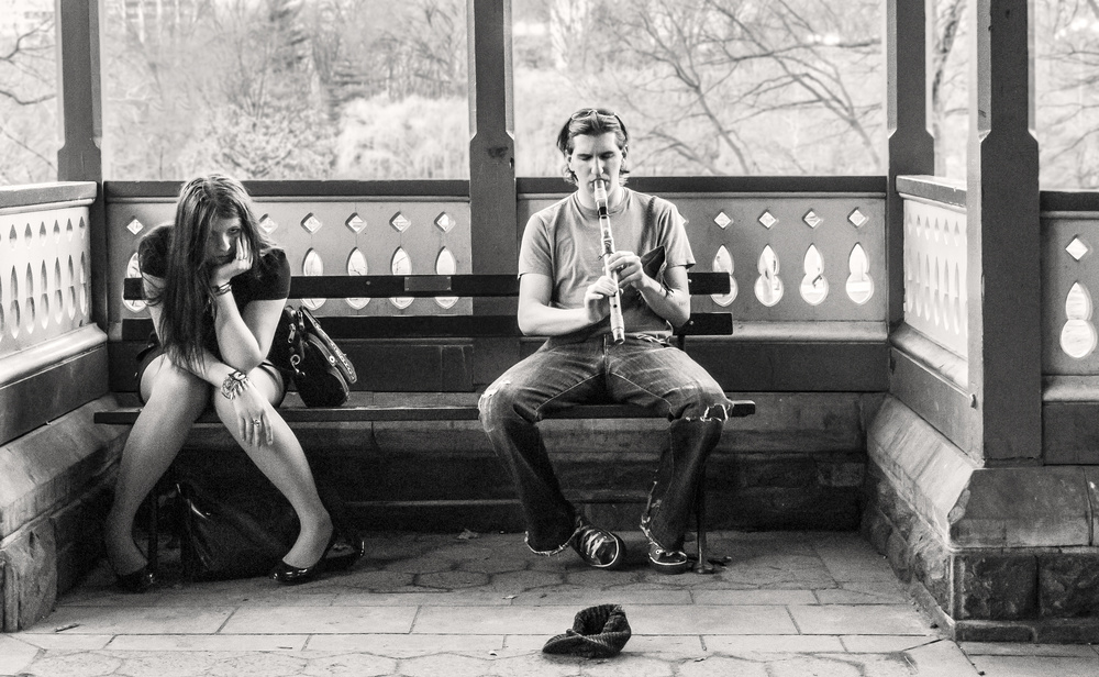 Flute Player Park Bench by Milton Mpounas — canvas wall art